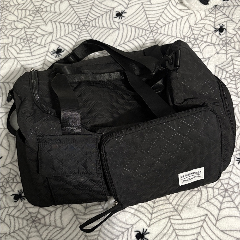 Black Quilted Duffel Bag
